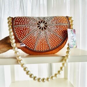America and Beyond Limited Edition Vibrant Orange Pearl Beaded Shoulder bag.